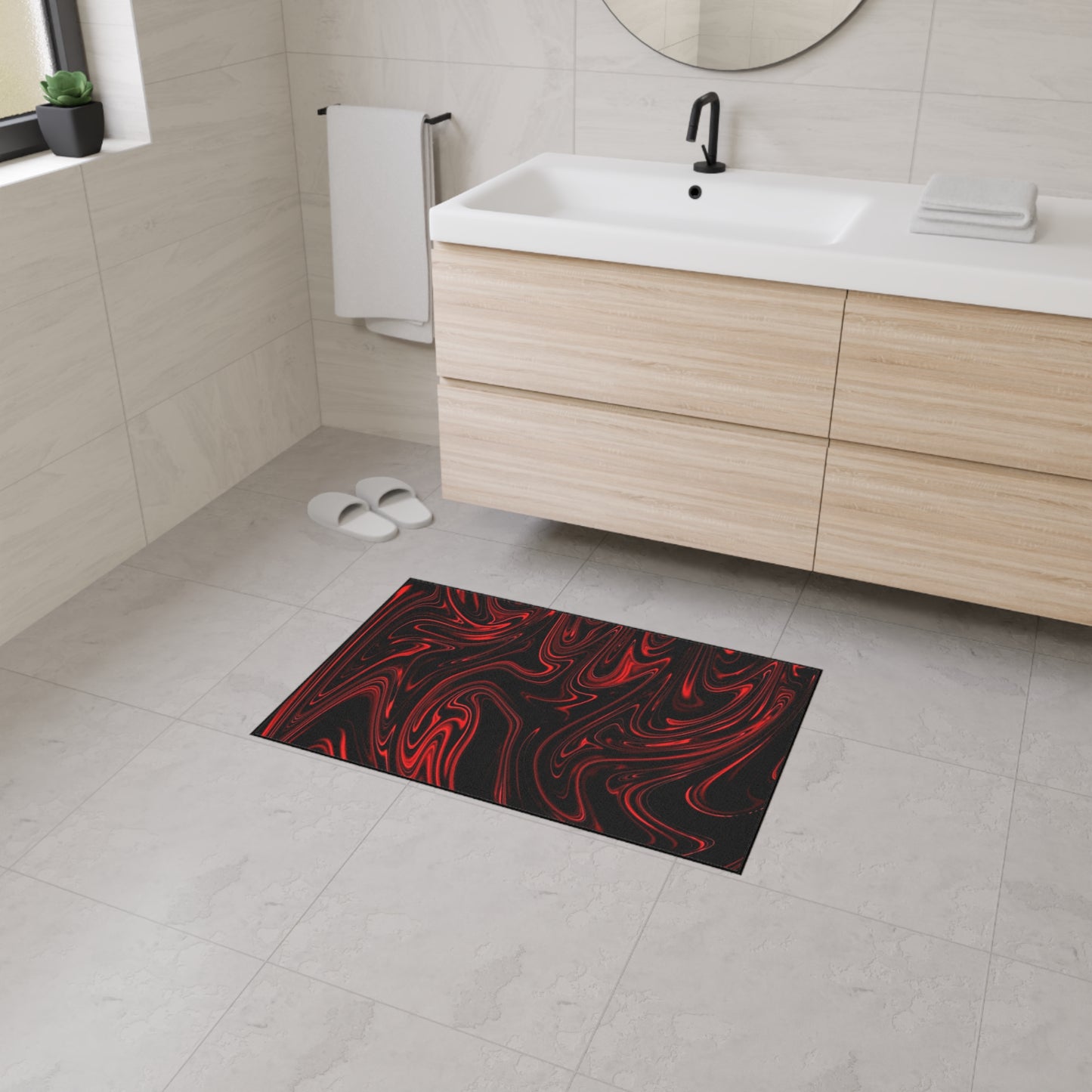 Bathroom with a red and black patterned rug on the floor.