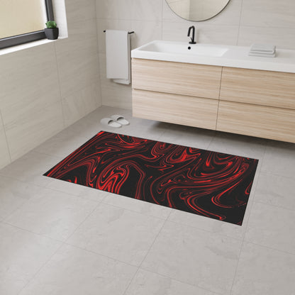 Black and red patterned rug on a bathroom floor with a sink and towel in the background.