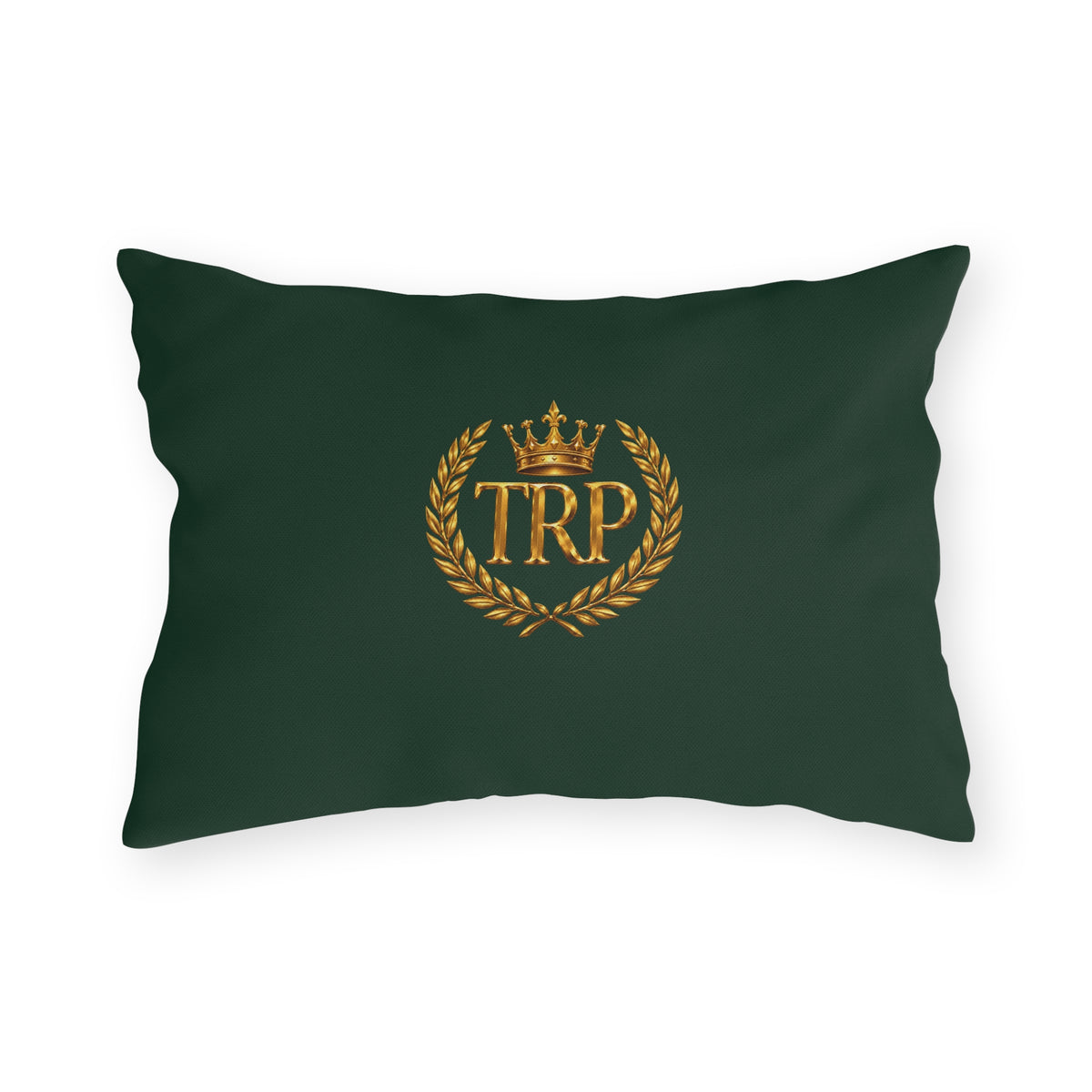 Dark green rectangular accent pillow showcasing the metallic gold TRP monogram framed by a royal crown and laurel wreath crest.