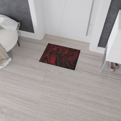 Black doormat with red text on a wooden floor in a room setting