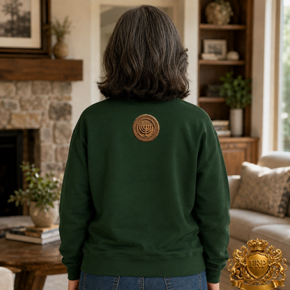 Back view of a unisex forest green sweatshirt featuring the round Sevenfold Light Menorah insignia on the upper back.