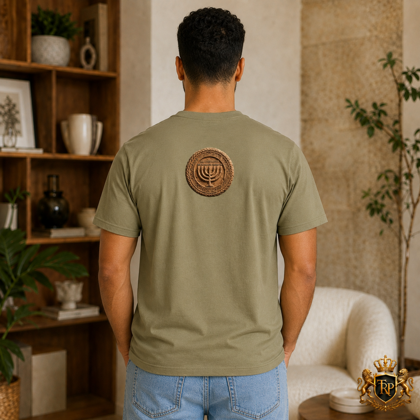 Back angle of man wearing faded brown t-shirt featuring circular Sevenfold Light Menorah graphic.