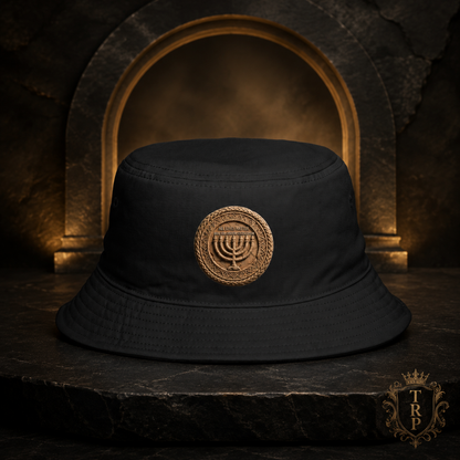 Front view of the black All Lives Matter bucket hat featuring The Sevenfold Light menorah emblem on a dark stone pedestal.
