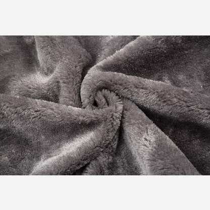 Close-up macro view of the soft, ultra-warm 220 GSM dark grey fleece fabric texture used inside the David Coat hoodie lining.