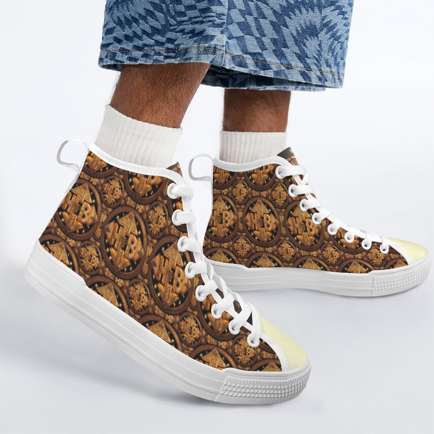 Side view of a person wearing the brown patterned Four Corners high-top canvas shoes with denim shorts.