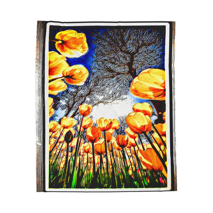 Full flat lay of The Garden Beyond the Winter velveteen plush blanket showing upward-view floral artwork with golden tulips and blue sky.