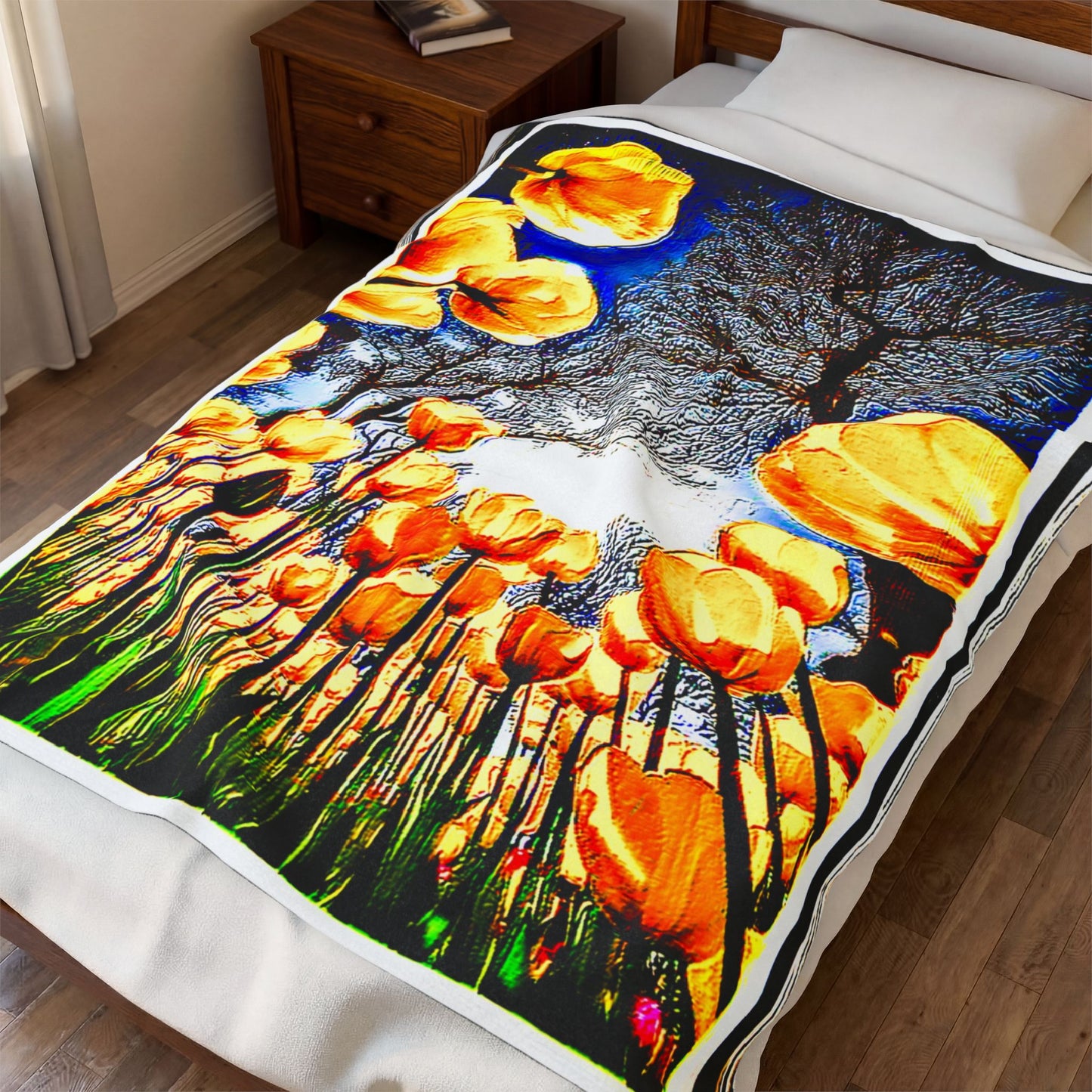 Angled view of The Garden Beyond the Winter plush blanket on a single bed, showcasing vibrant golden tulip artwork and white borders.