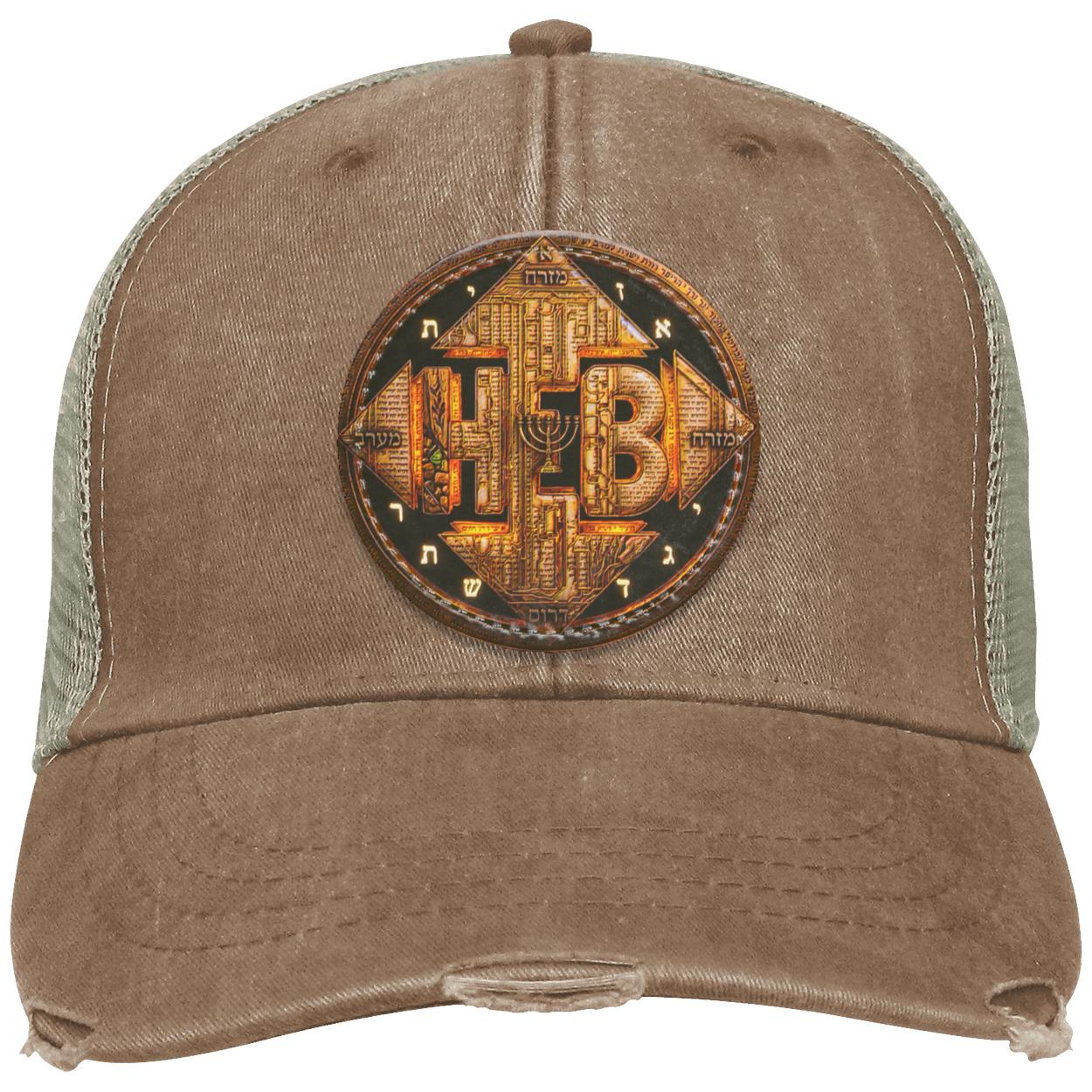 Front studio shot of the brown distressed Ollie trucker cap highlighting the intricate, circular "Four Corners of the Faith" embroidered patch.
