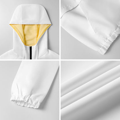 Close-up details of the women's half-zip hoodie showing the hood lining, pocket hem, elastic cuff, and fabric texture.
