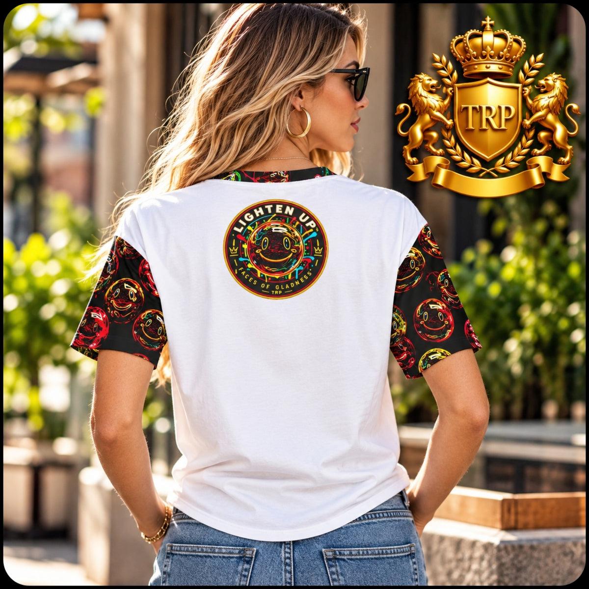 Back view of woman wearing the Lighten Up tee showing the Faces of Gladness smiley crest emblem printed on the upper back.