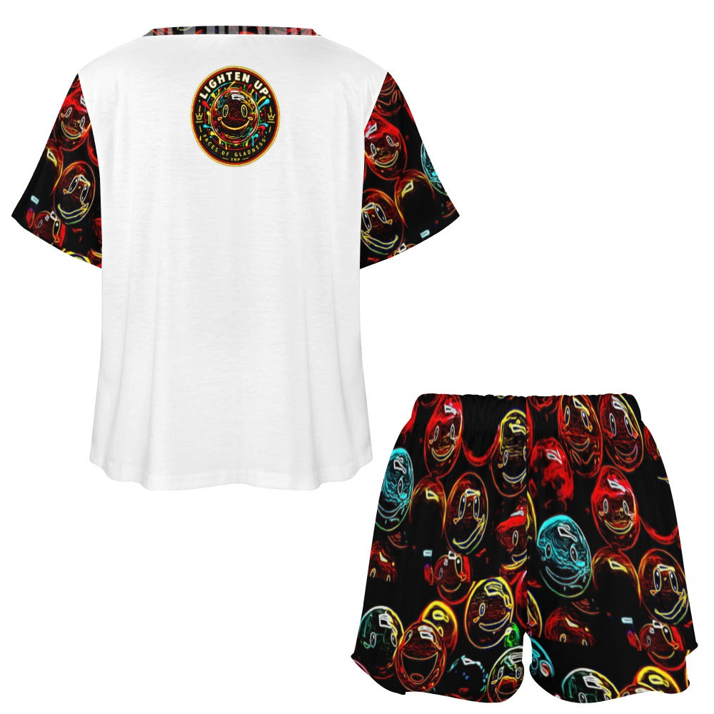 Back view of the Lighten Up women's lounge set showcasing the upper back logo emblem and patterned lounge shorts.