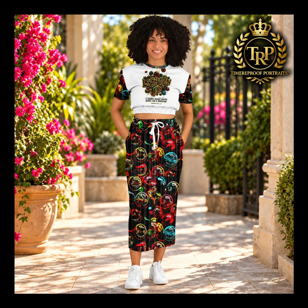 Model smiling in Lighten Up cropped sweatshirt and matching Proverbs 17:22 maxi skirt with hands in front pockets.