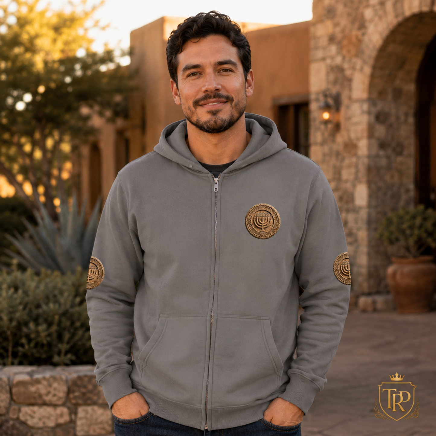 Front view of a man wearing the grey relaxed faded zip hoodie with the Sevenfold Light chest emblem.