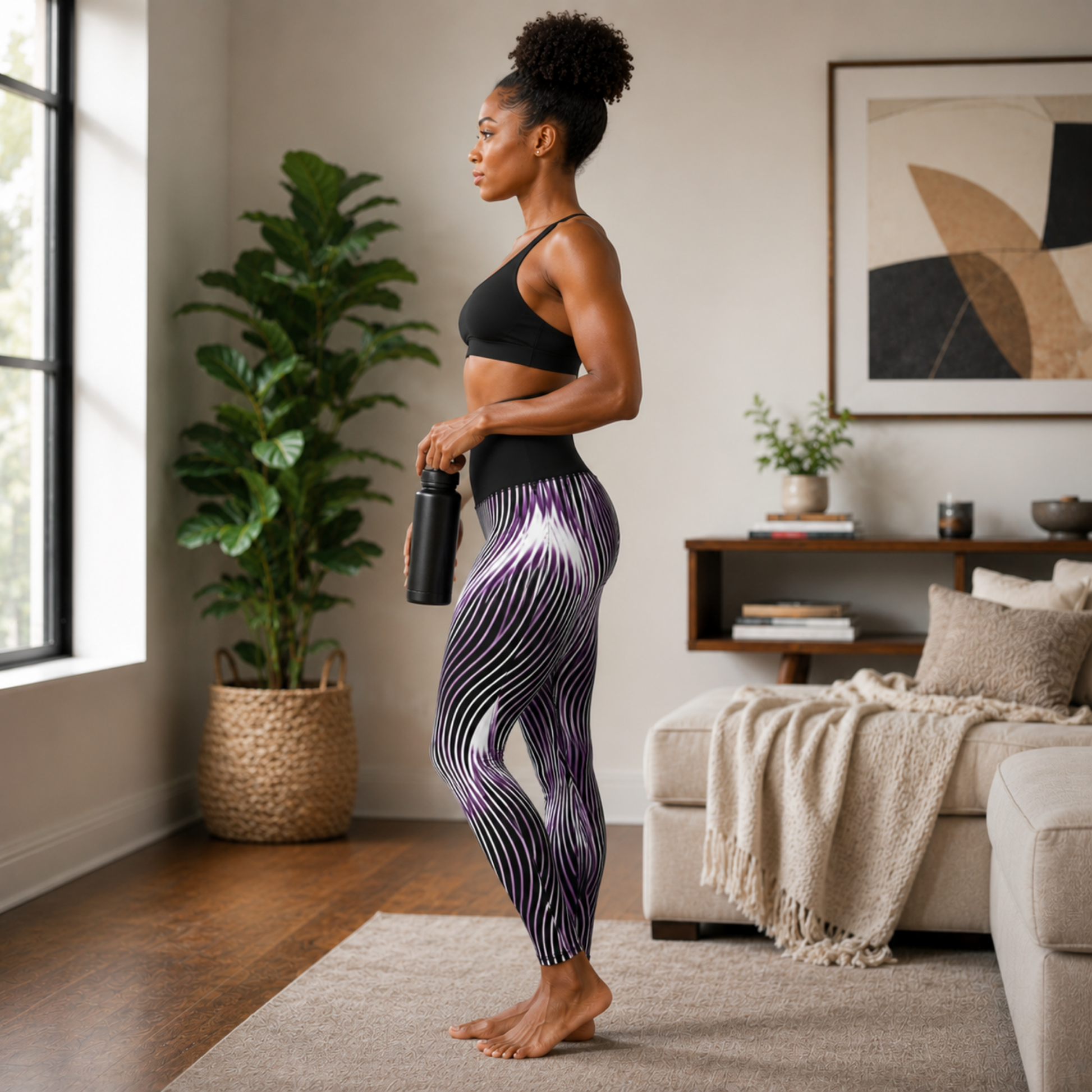 Profile view of a woman wearing the high-waisted Orot Series purple and black optical illusion leggings.