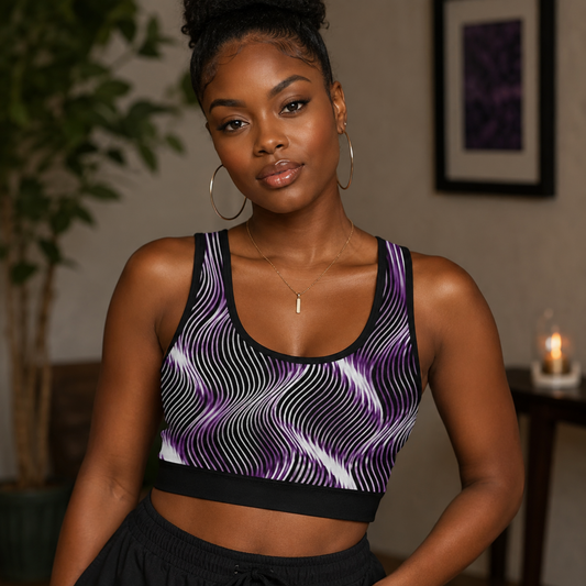 Front view of a model wearing the Orot Series OR ARGAMAN royal light purple sports bra with a black and white wavy line pattern.