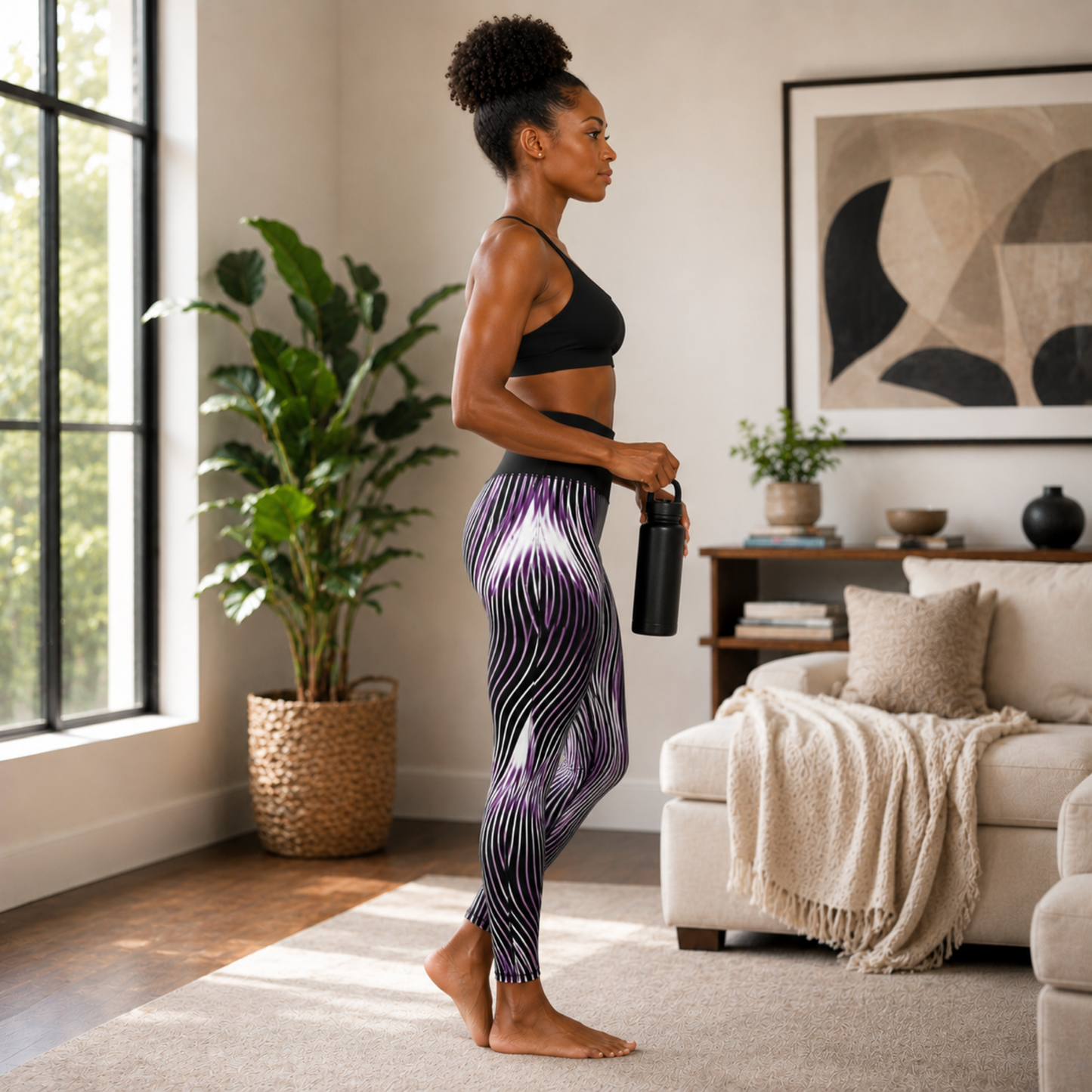 Side view of a woman showcasing the fit and purple zebra-like wave pattern of the OR ARGAMAN leggings.