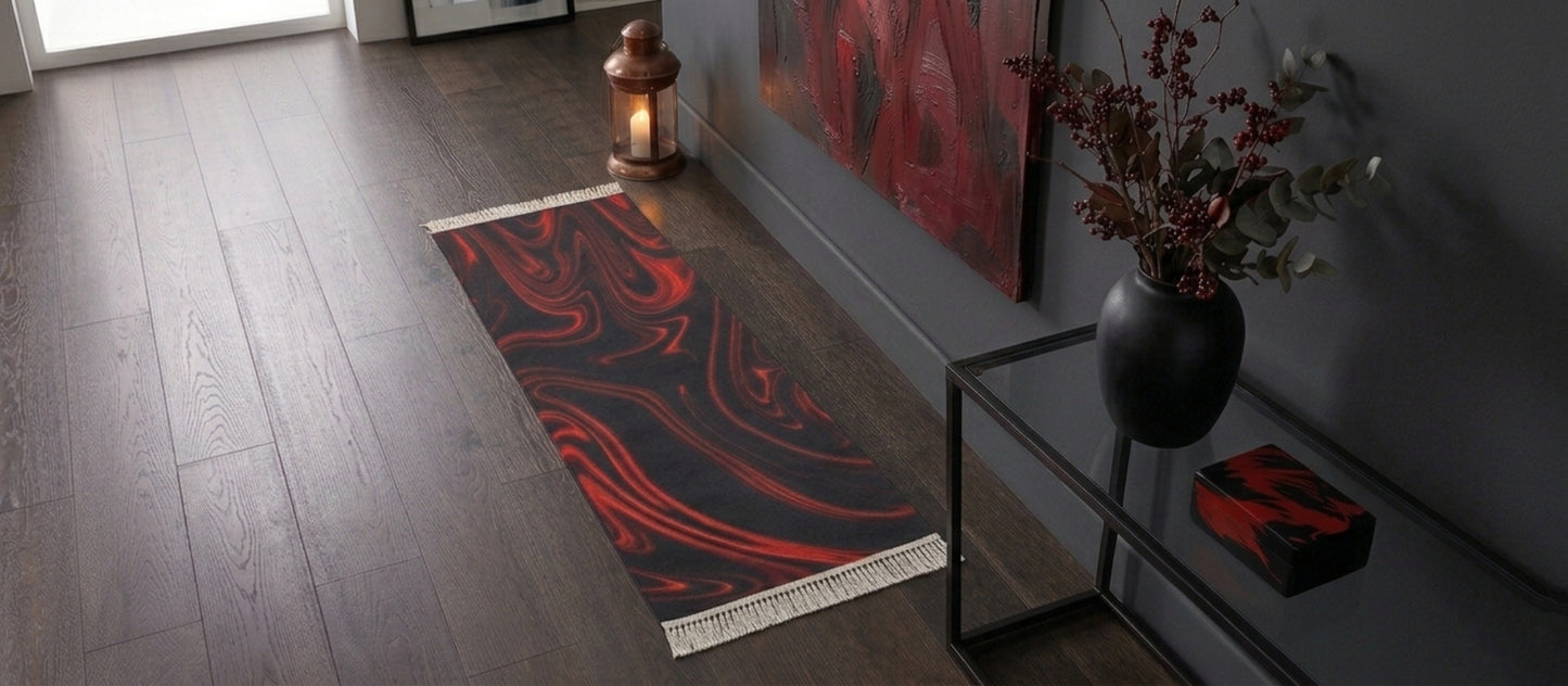 A narrow red and black marble runner rug in a moody hallway with dark grey walls, a copper lantern, and a glass console table with a black vase.