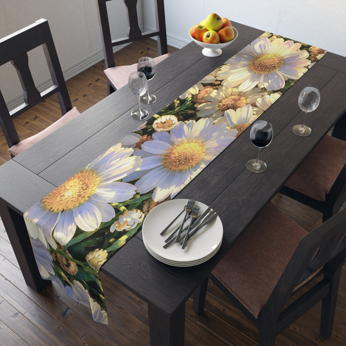 Full view of The Dawning Field floral daisy cotton twill runner styling a dark wood dining table with wine glasses and plates.