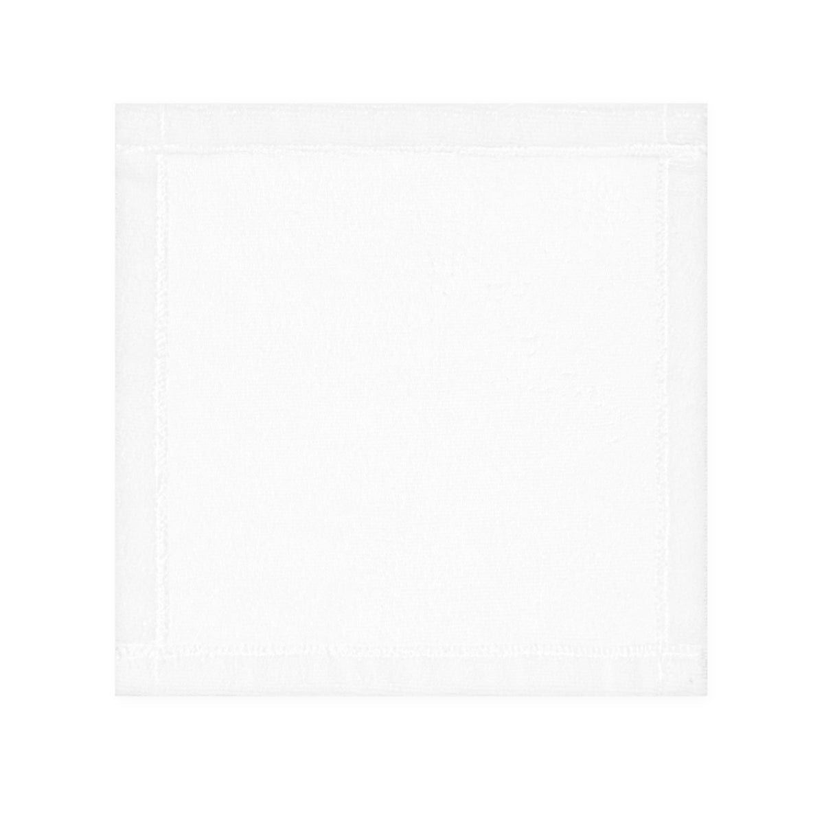 Solid white reverse side of The Dawning Field hand and face towel showing clean edge stitching.