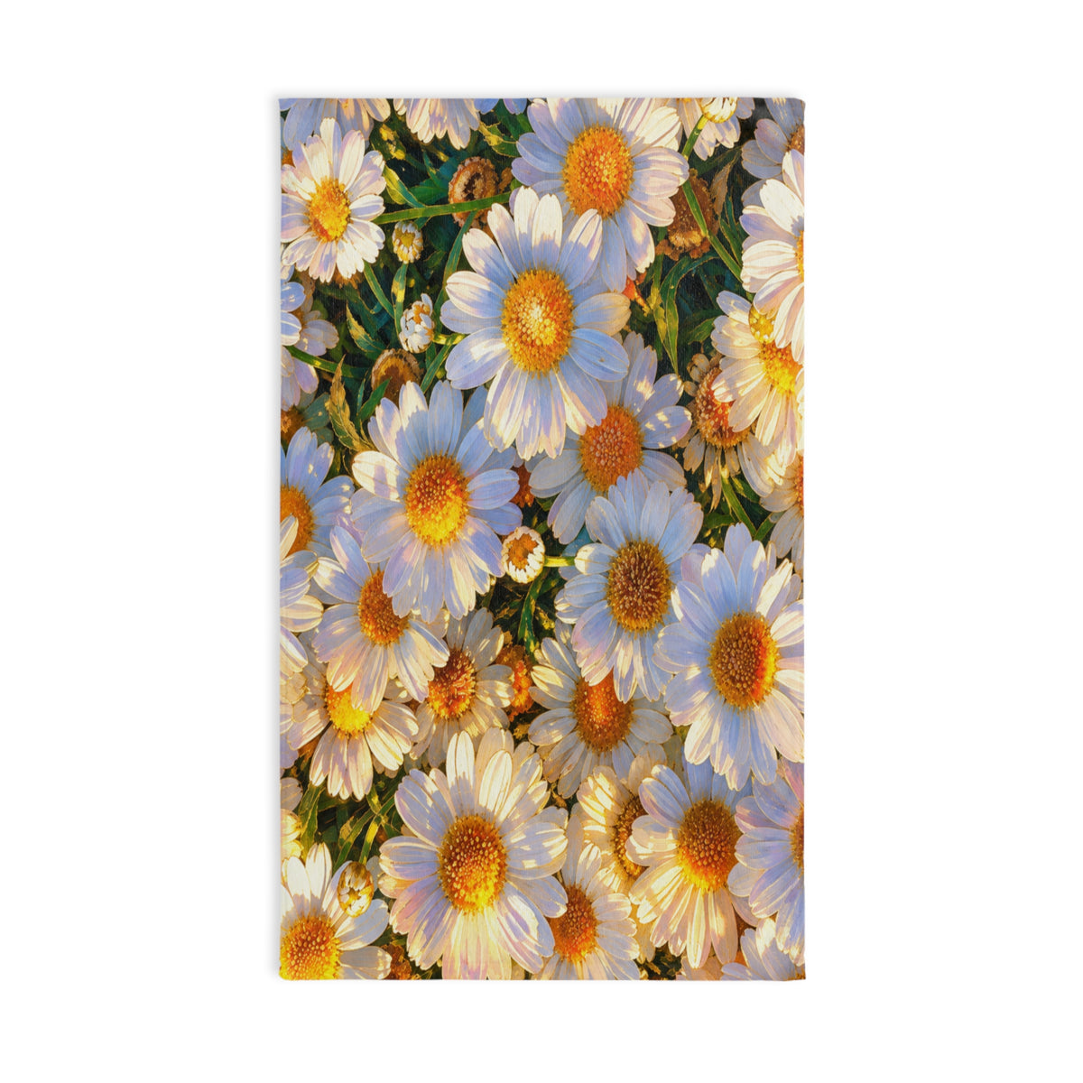 Full front view of The Dawning Field hand towel flat on a white surface, displaying a lush botanical pattern of sunlit white daisies.