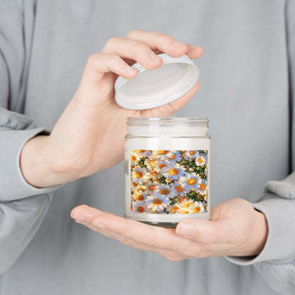 Person holding an opened The Dawning Field 9oz scented soy candle in a clear glass jar with the white lid lifted.