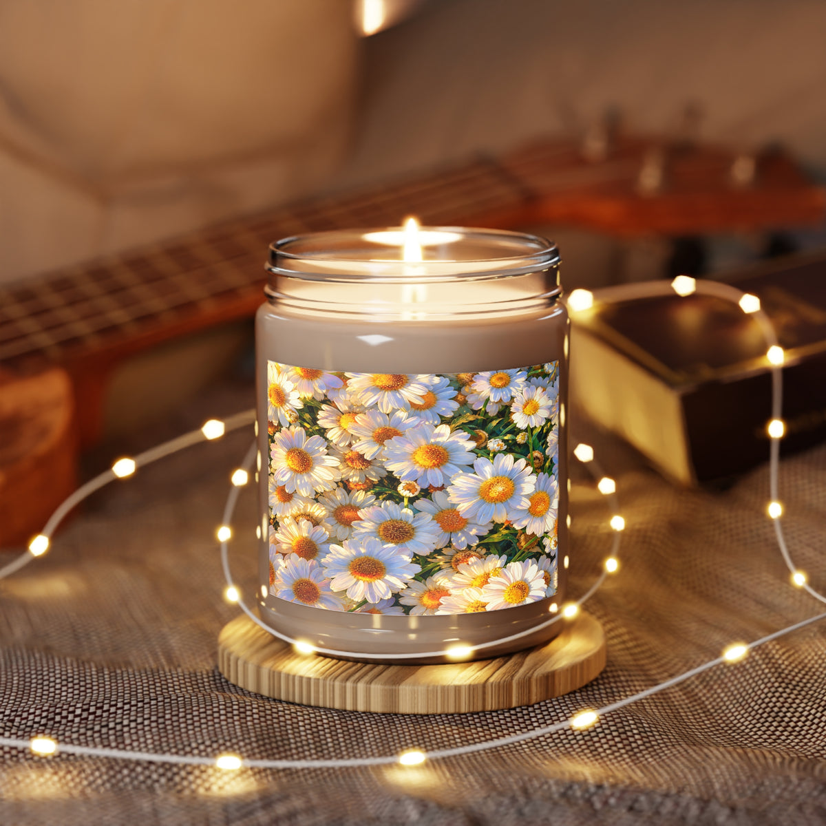 Burning The Dawning Field 9oz soy candle in a clear glass jar placed on a cozy windowsill with glowing holiday lights.