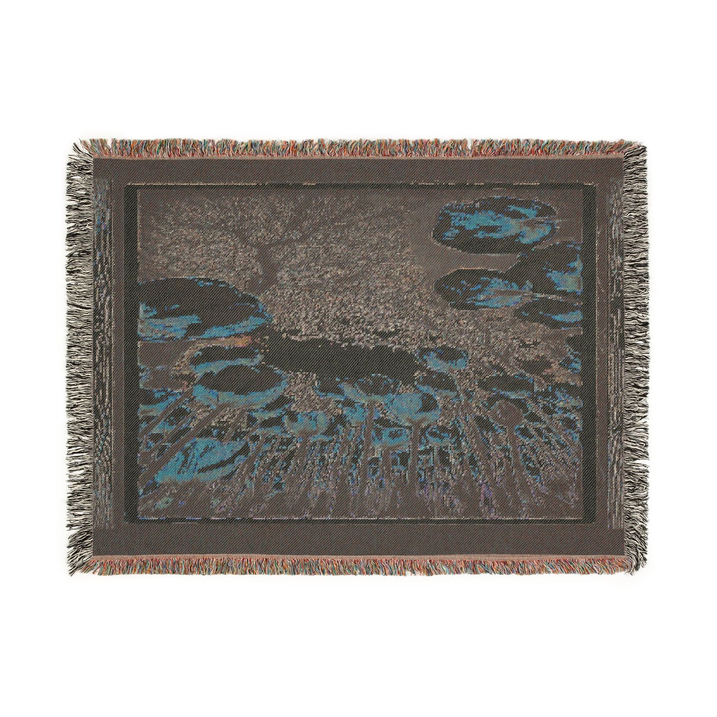 Reverse side of The Garden Beyond the Winter woven art throw blanket in horizontal view, highlighting inverted weave tones and fringe.