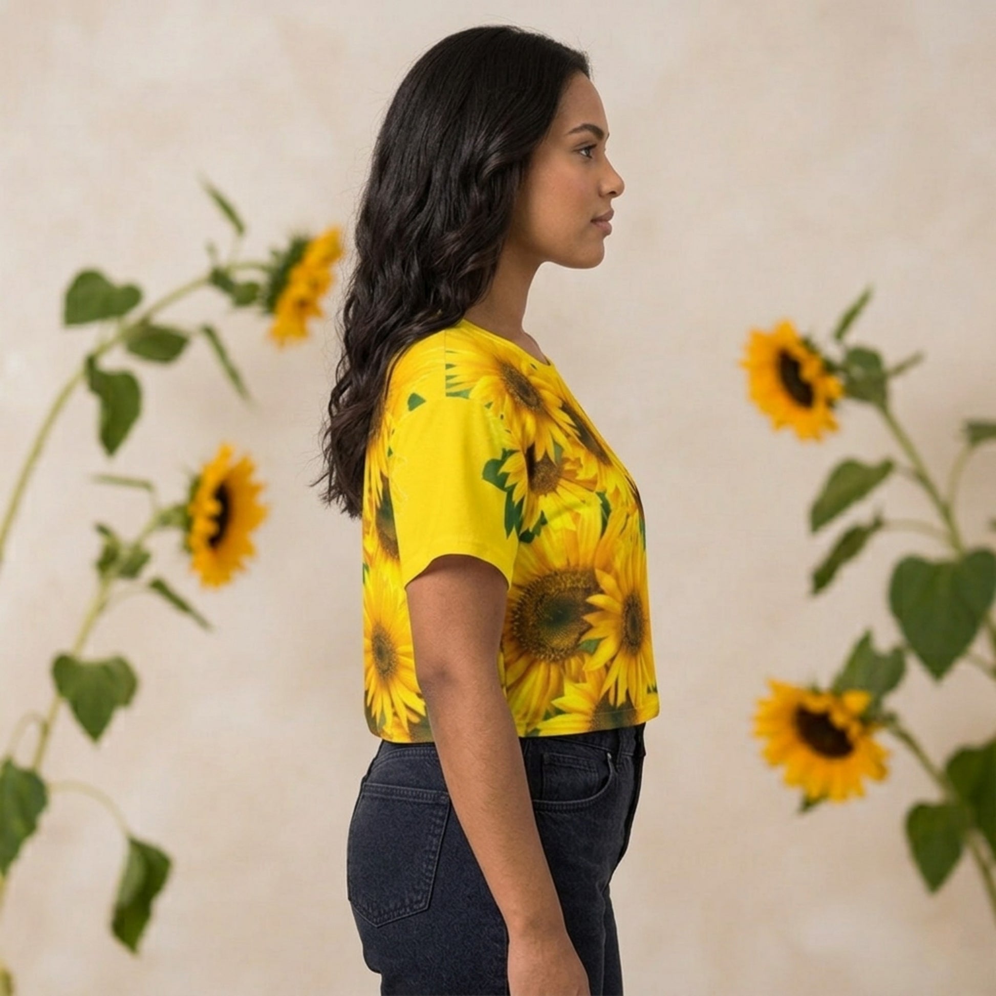 Right side profile view of the cyber yellow batwing sleeve top decorated with a dense, vivid sunflower print.
