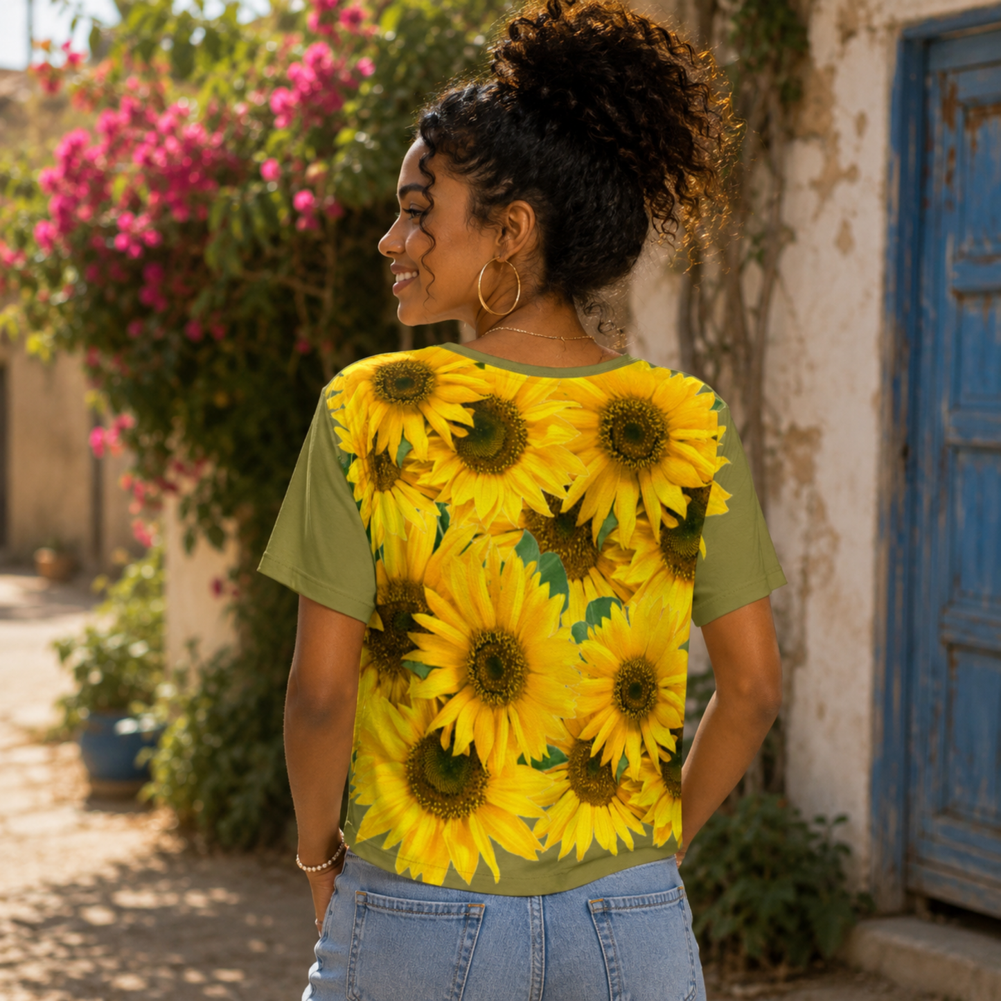 Back view of the old moss green batwing sleeve t-shirt showcasing the detailed and seamless all-over yellow sunflower design.