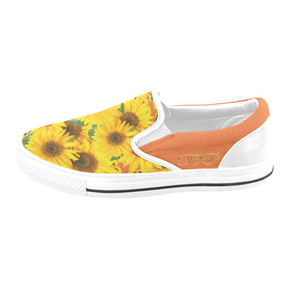 Lateral side view of TRP Sunflowers in Symmetry women's canvas slip-on shoe with vivid red tangelo (orange-colored) side panel accents and white soles.
