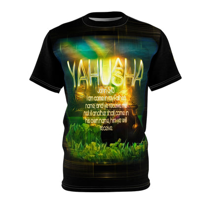 Front view mockup of the Yahuah Yahusha t-shirt on a white background, highlighting the green and yellow glowing graphic design.