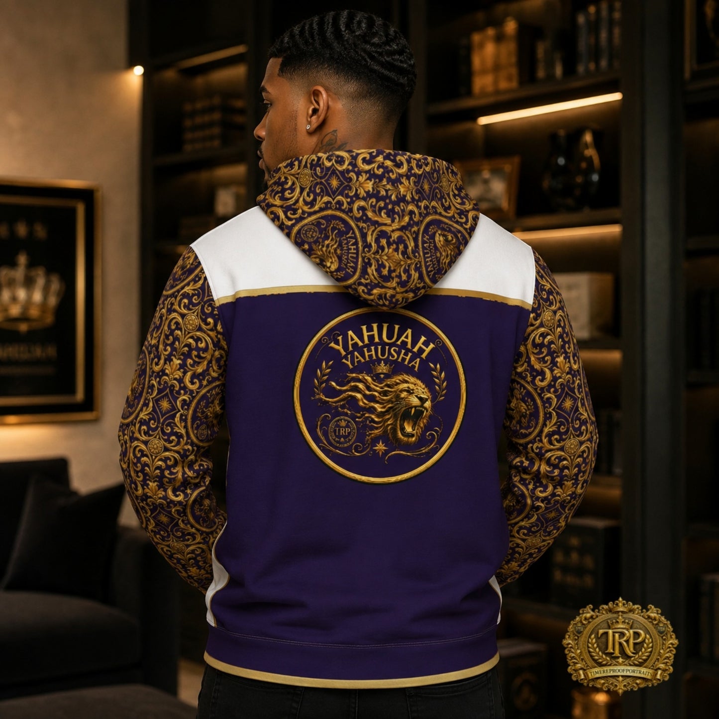 Back view of model wearing Yahuah Yahusha hoodie showing large roaring lion seal emblem on dark purple back panel and pattern hood.