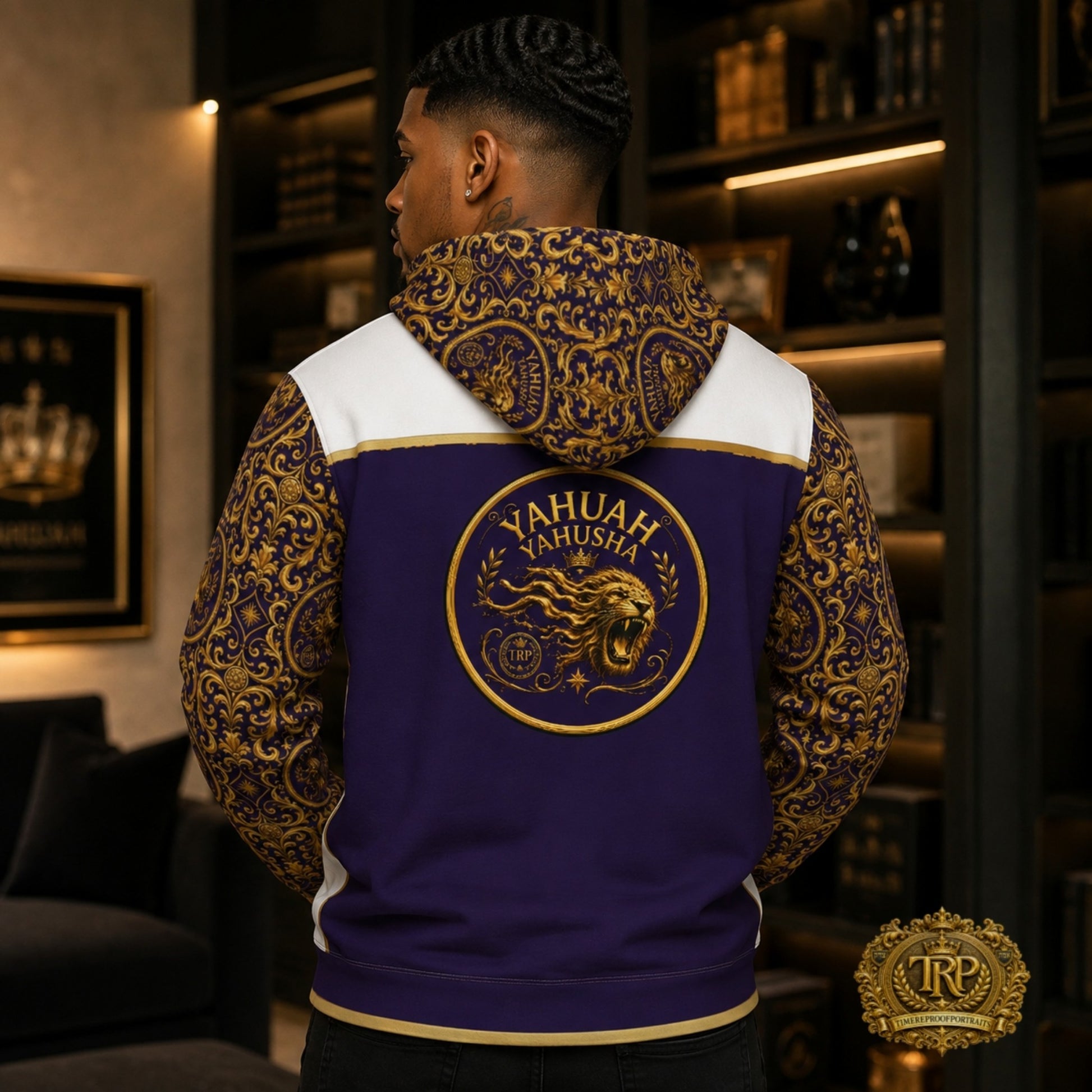 Back view of model wearing Yahuah Yahusha hoodie showing large roaring lion seal emblem on dark purple back panel and pattern hood.