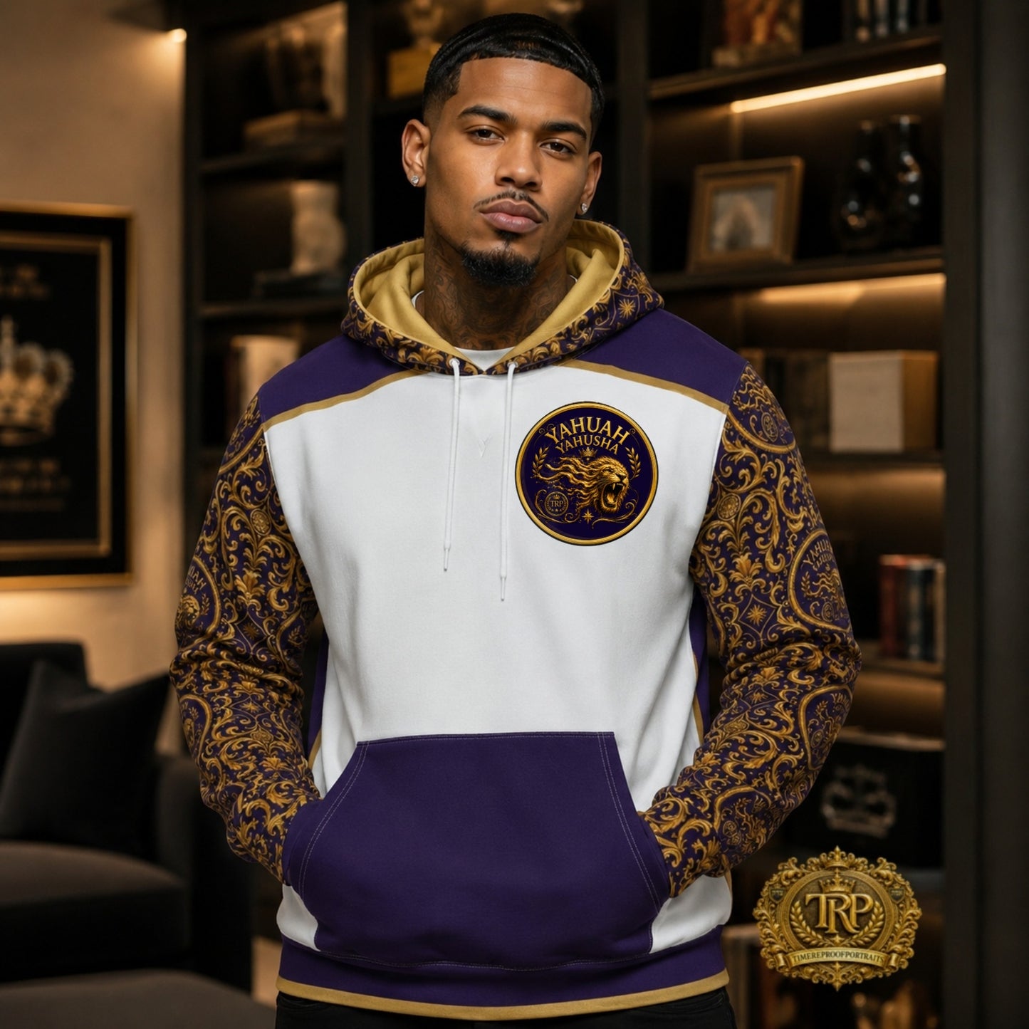 Front view of model in Yahuah Yahusha hoodie with gold ornate patterned sleeves, white chest, and dark purple kangaroo pocket.